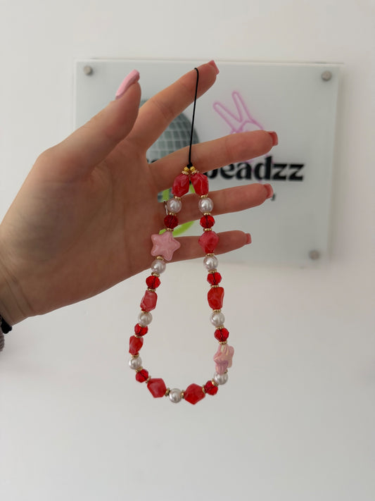 ‘Into the stars’ phone charm - pink/red