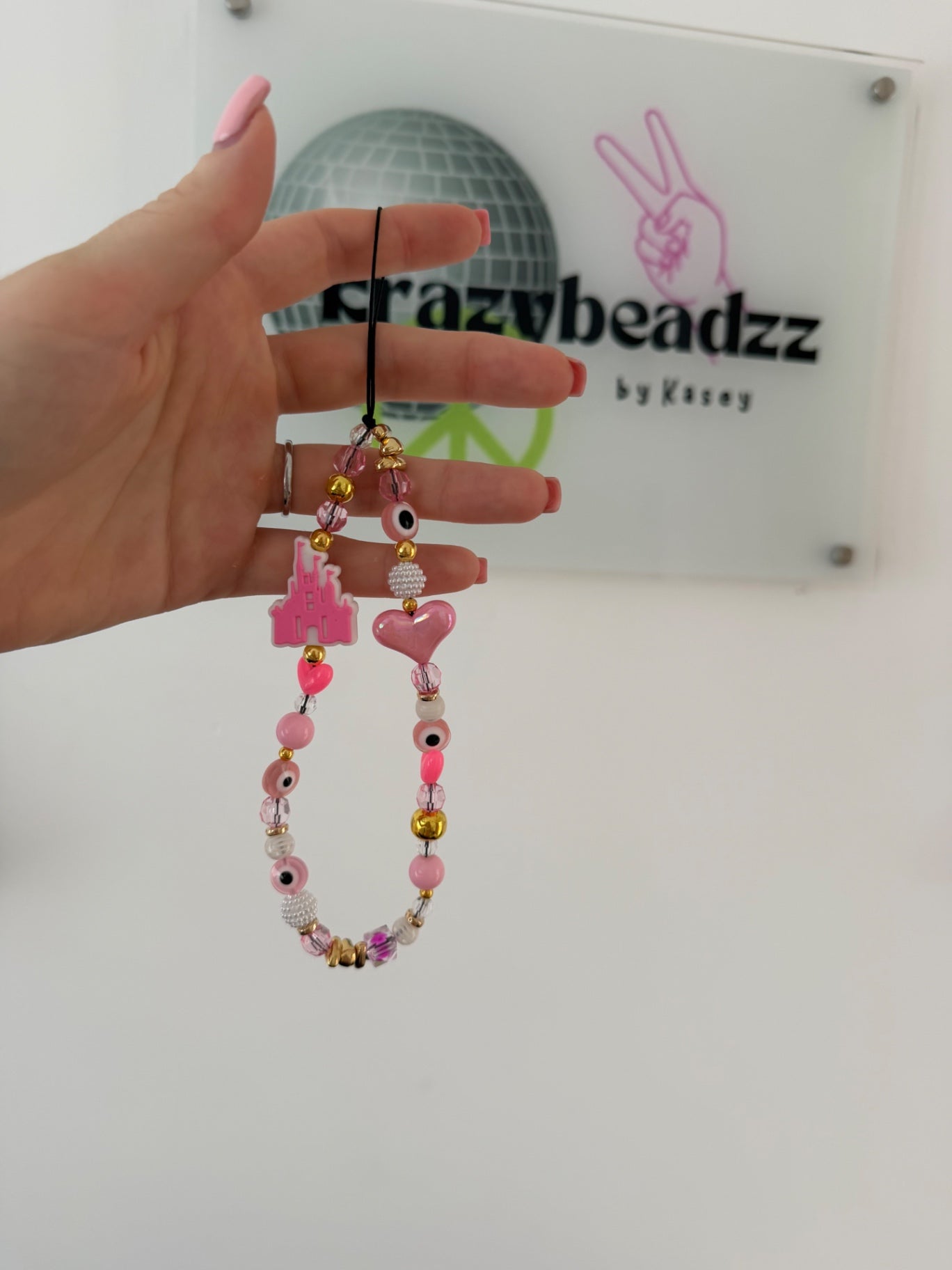 ‘Disney’ phone charm - pink