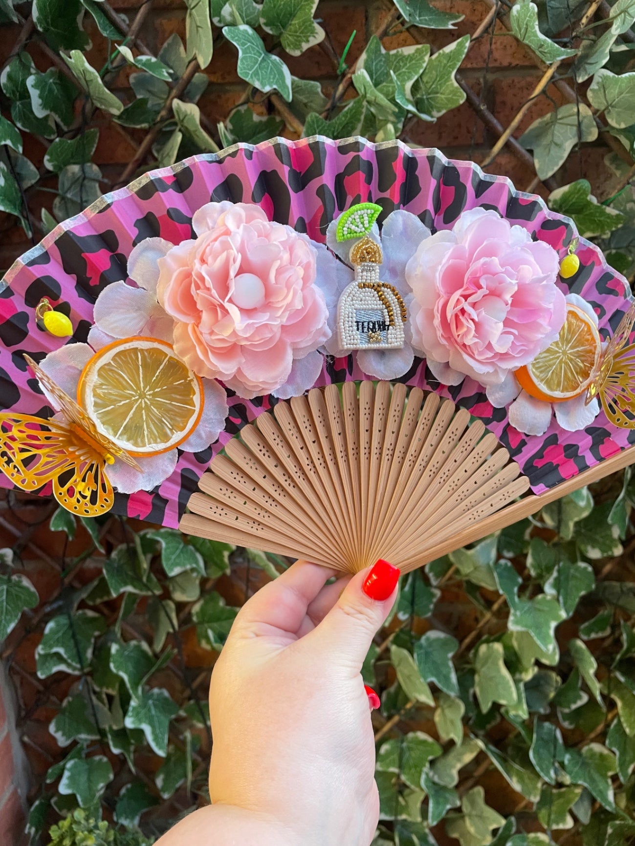 Leopard embellished folding fan 