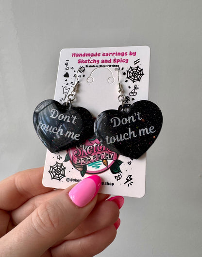 Black Glitter ‘Don’t Touch Me’ Heart Earrings