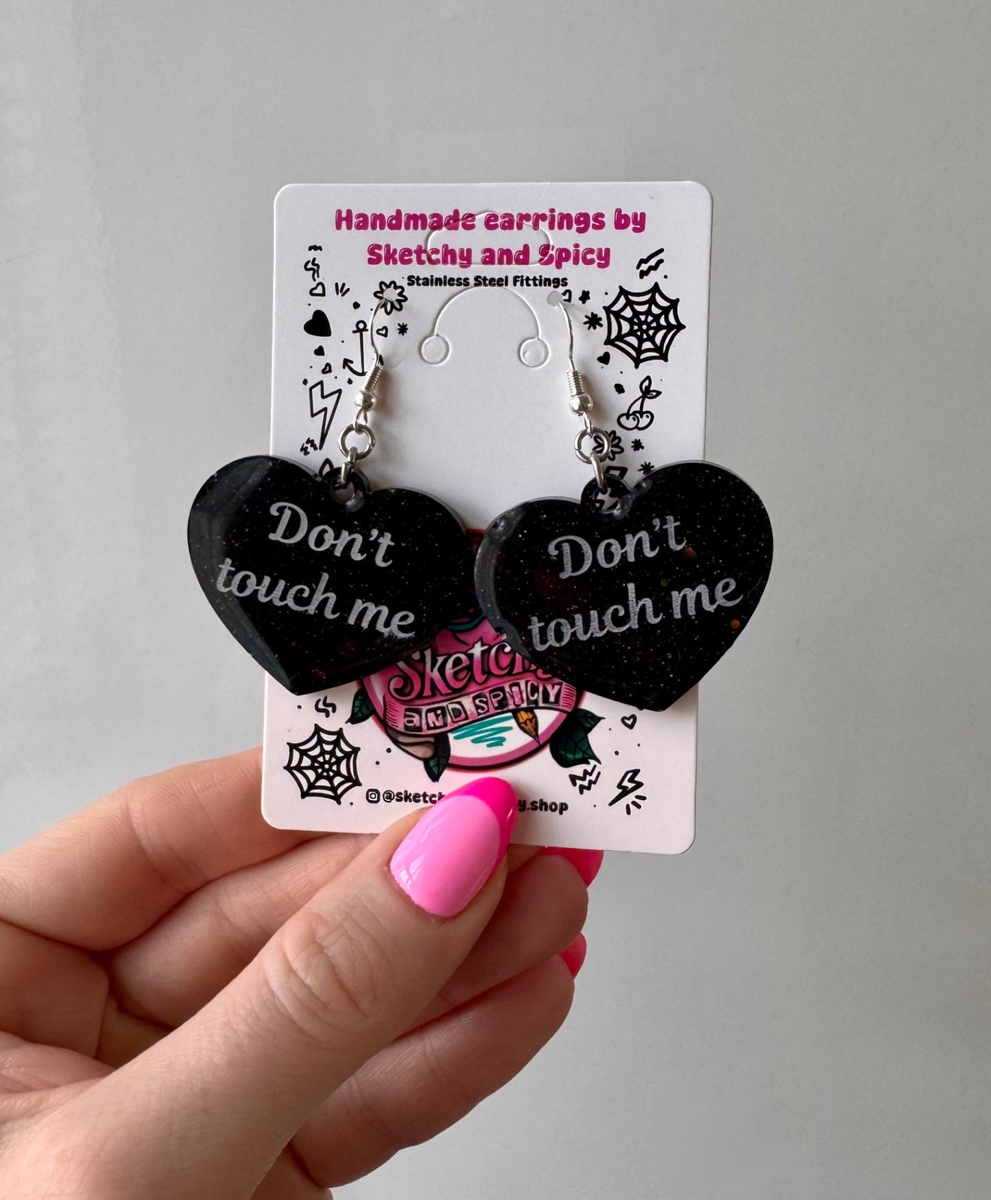 Black Glitter ‘Don’t Touch Me’ Heart Earrings