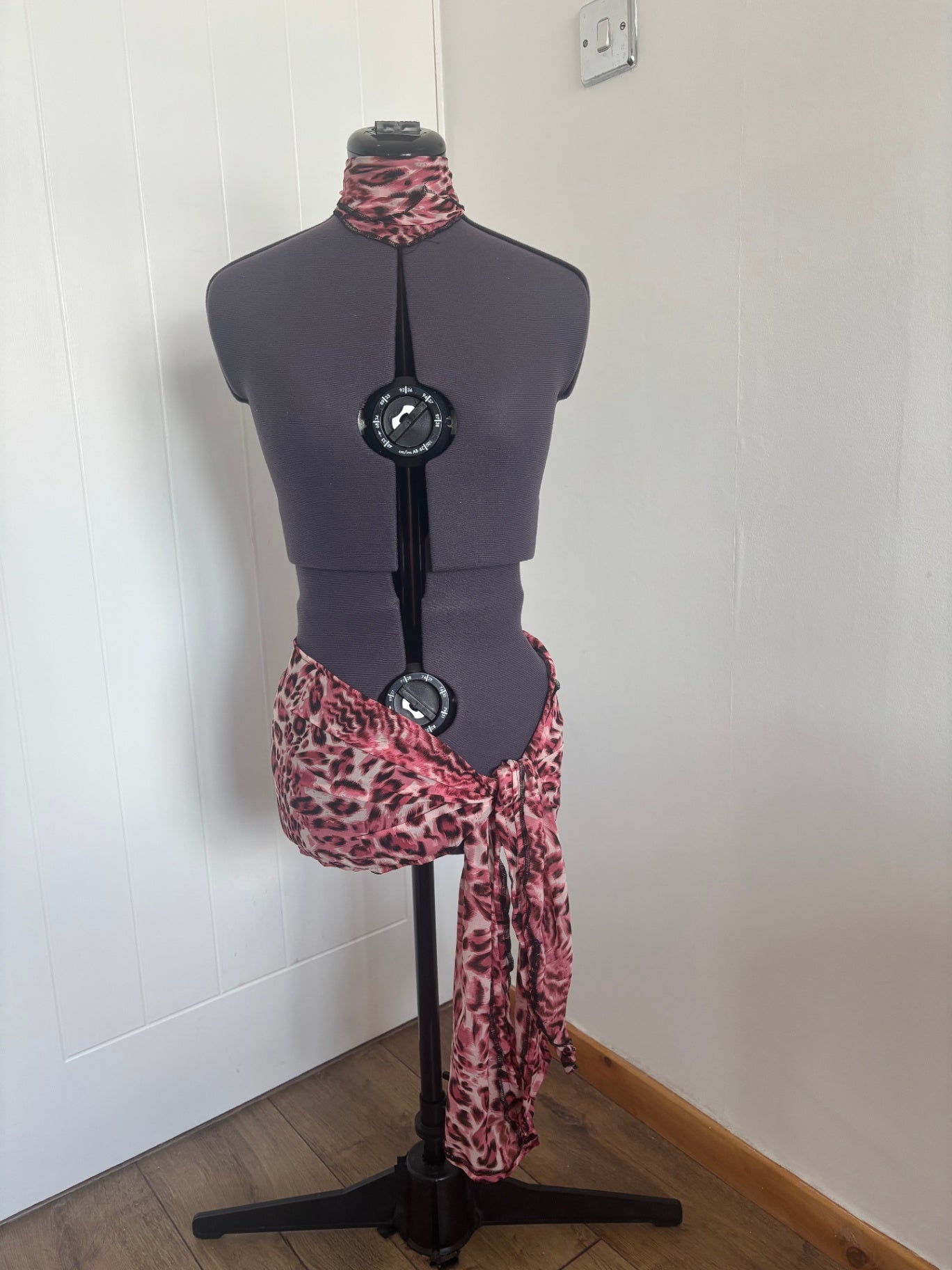 Mini sarong skirt and necktie