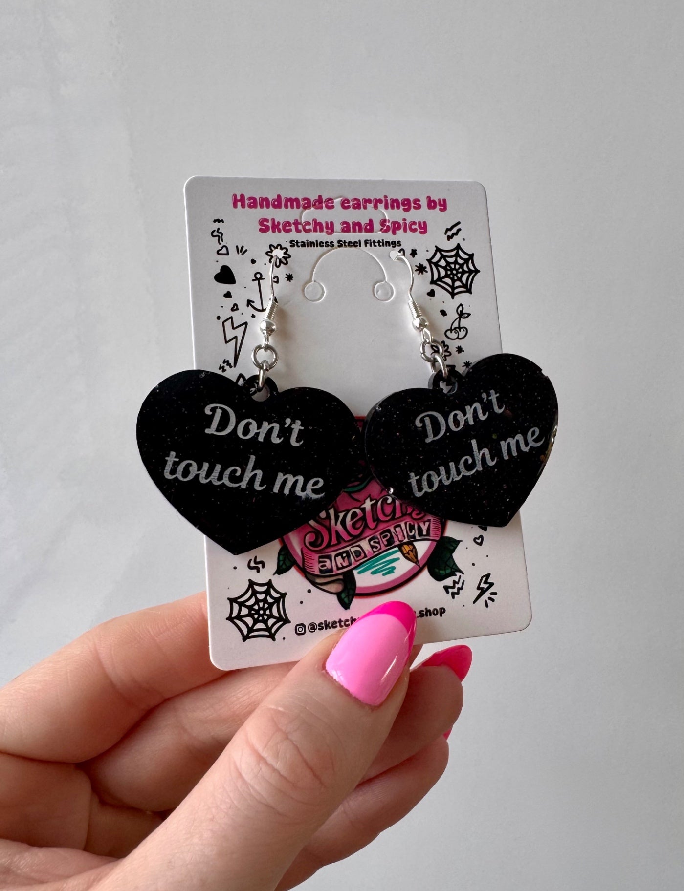 Black Glitter ‘Don’t Touch Me’ Heart Earrings
