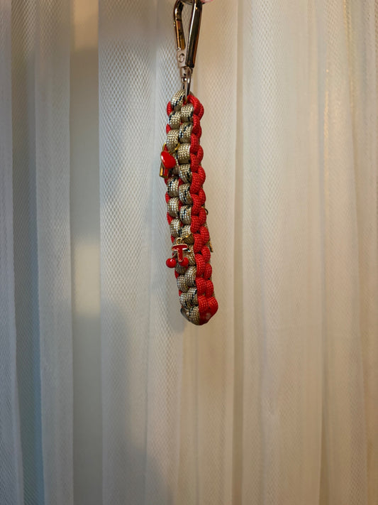 Red and beige charm keychain 