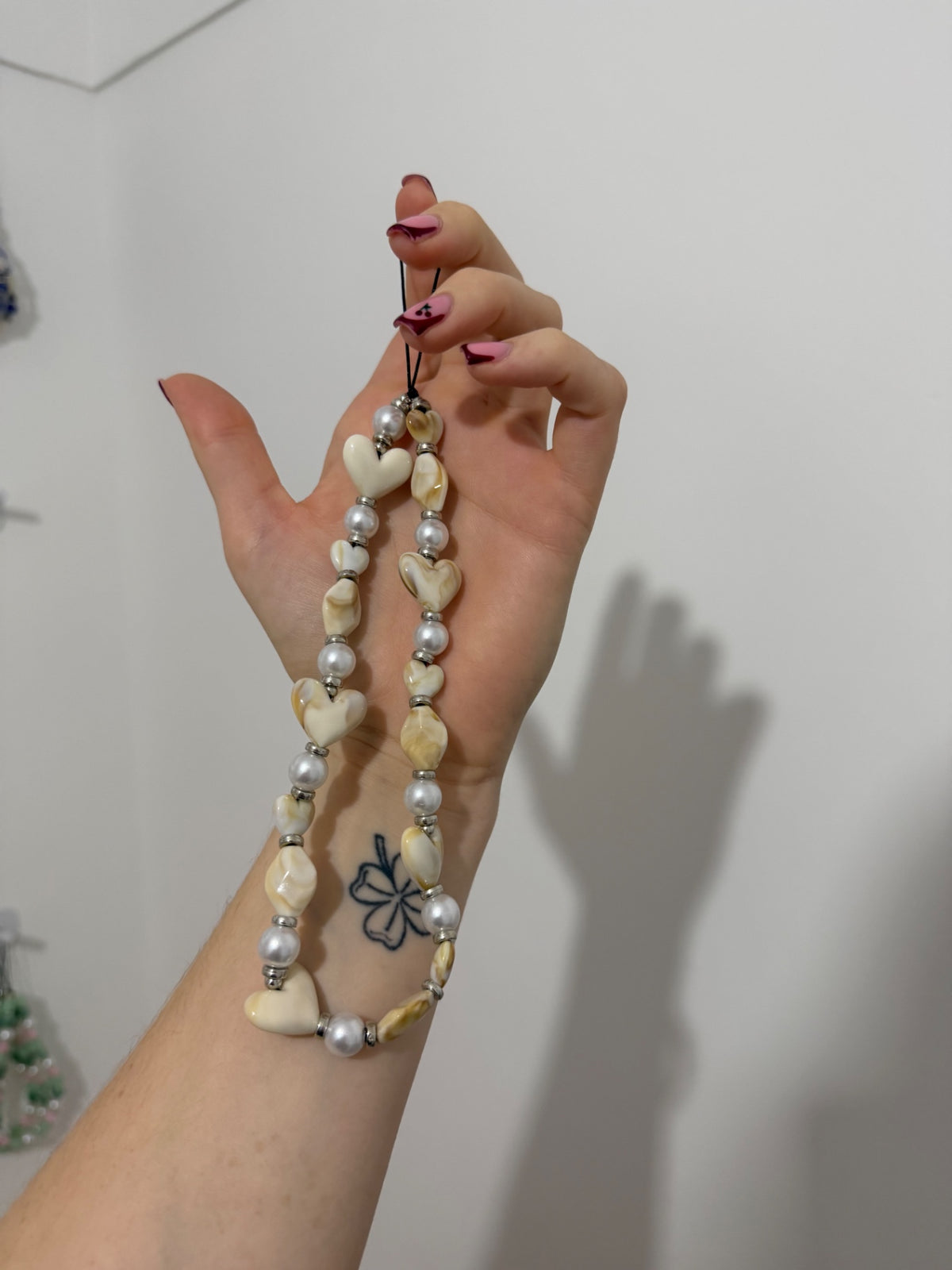 ‘Beige babe’ phone charm