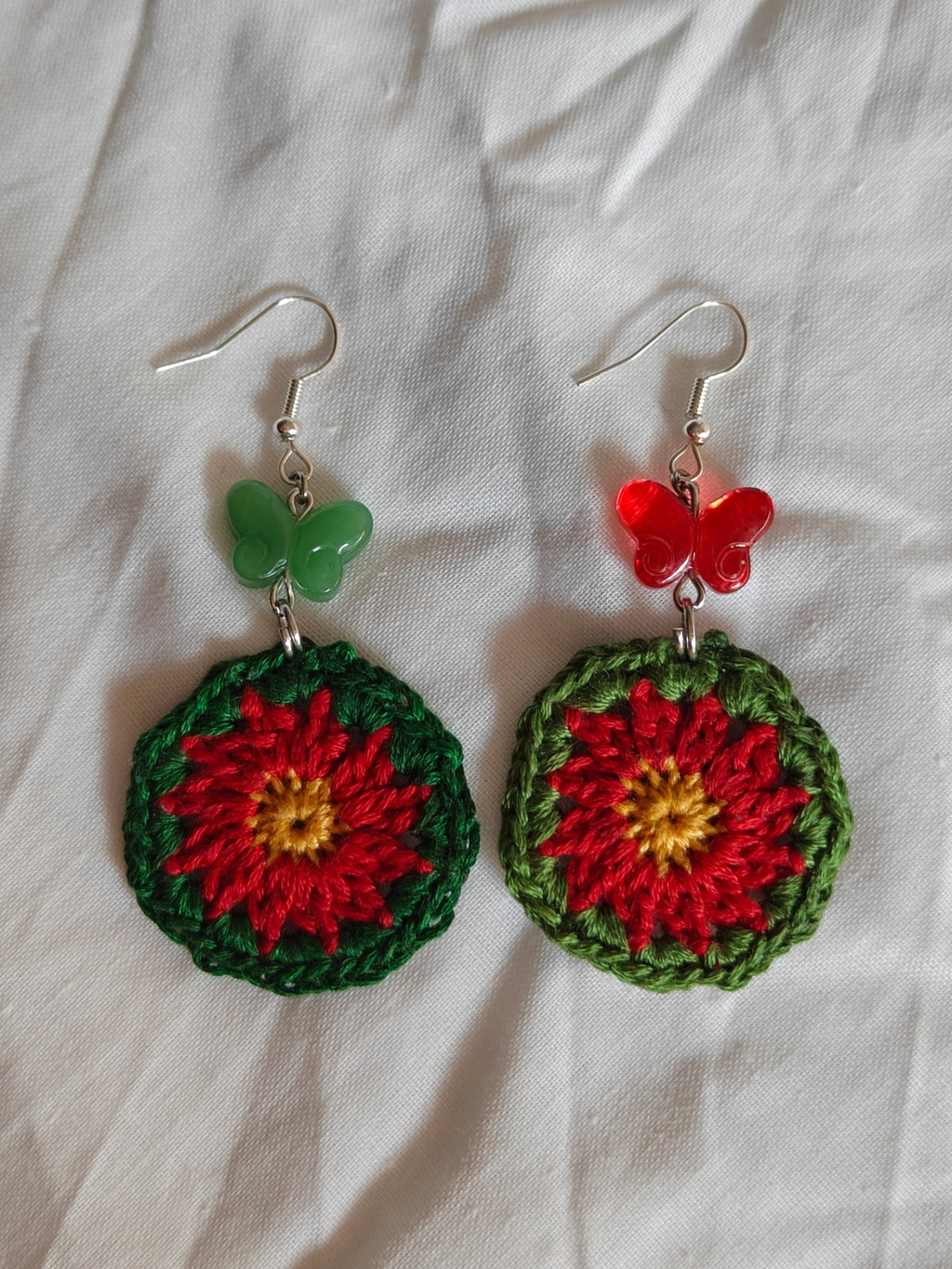 Crochet flower and glass butterfly earrings